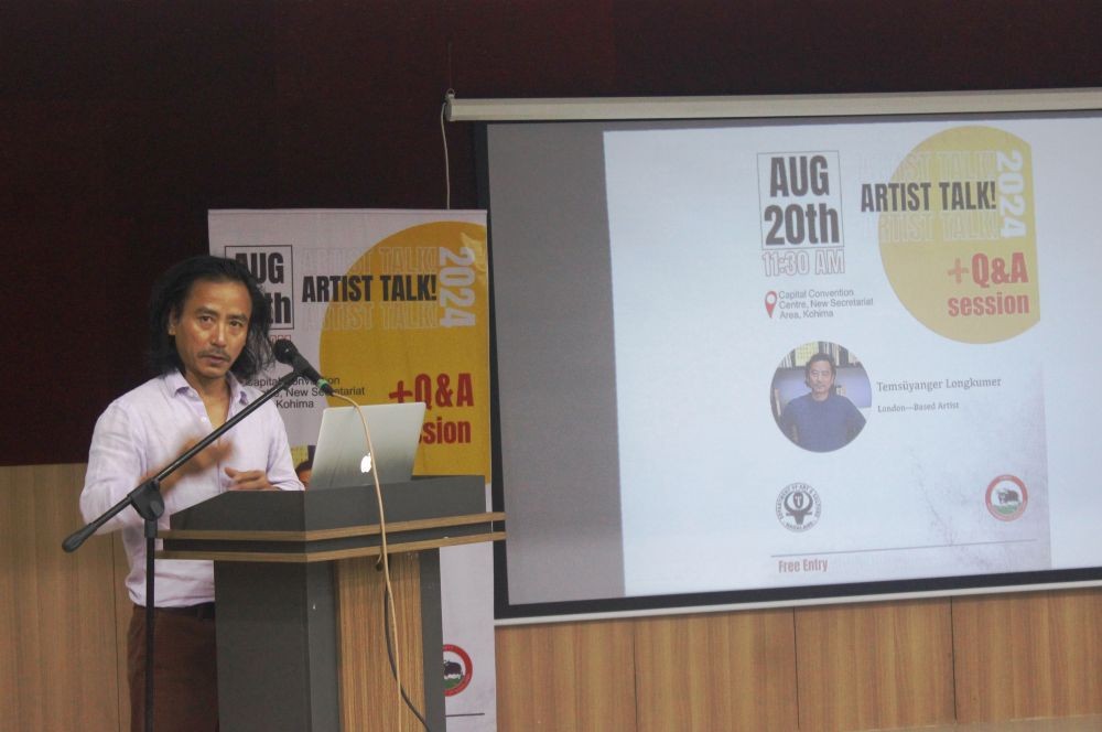 London-based artist, Temsüyanger Longkumer giving a talk at the Capital Convention Centre Kohima on August 20. (Morung Photo)